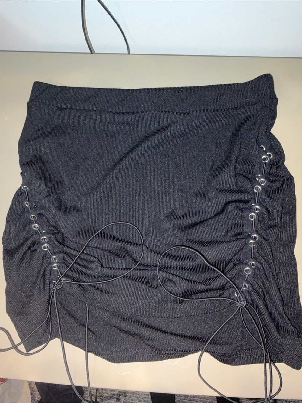 Black adjustable length skirt